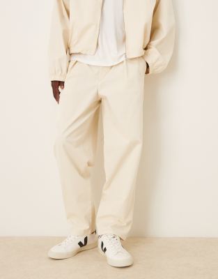 Asos Design Oversized Tapered Pants With Deep Pleat Detail In Neutral