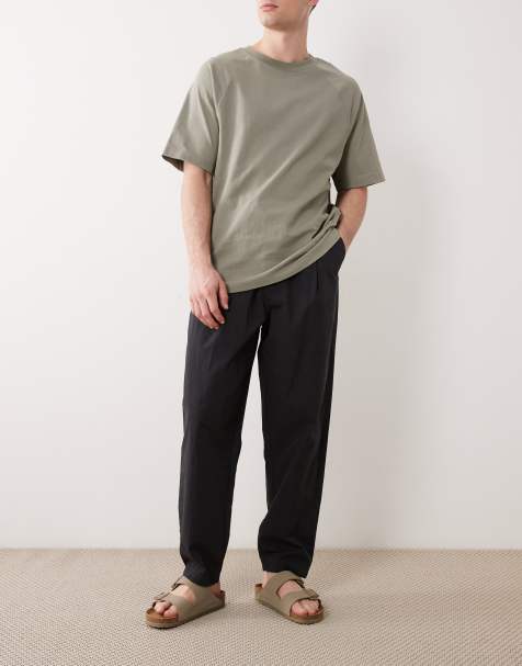 ASOS DESIGN oversized tapered pants with pleat in black techy fabric - view 1