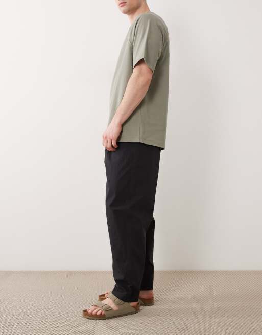 ASOS DESIGN oversized tapered pants with pleat in black techy fabric, 3 of 5