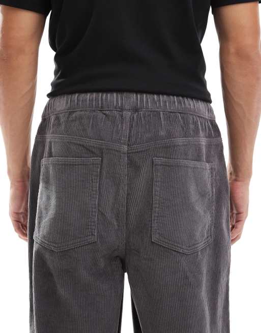 ASOS DESIGN oversized tapered pull-on pants in charcoal corduroy