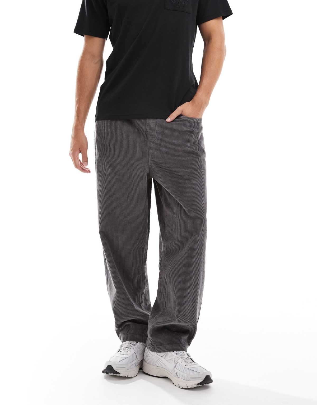 ASOS DESIGN oversized tapered pull on trousers in charcoal corduroy