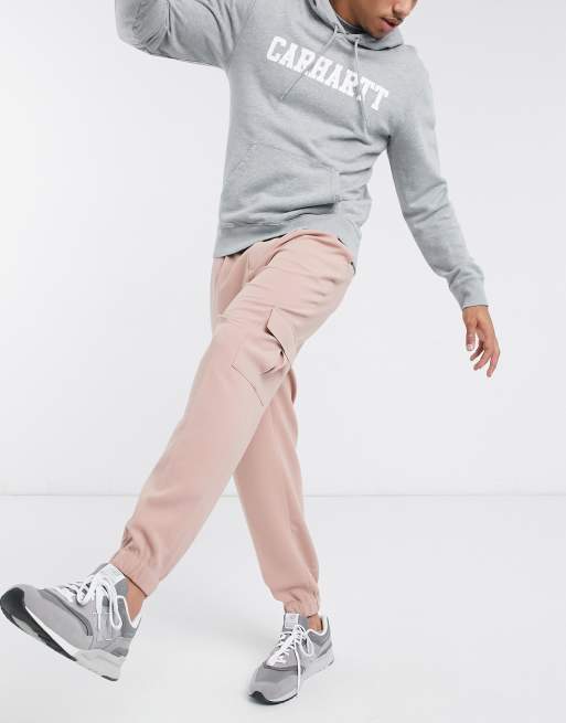 ASOS DESIGN oversized tapered smart jogger trousers in pink with cargo  pocket