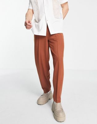 ASOS DESIGN oversized tapered smart trousers in rust