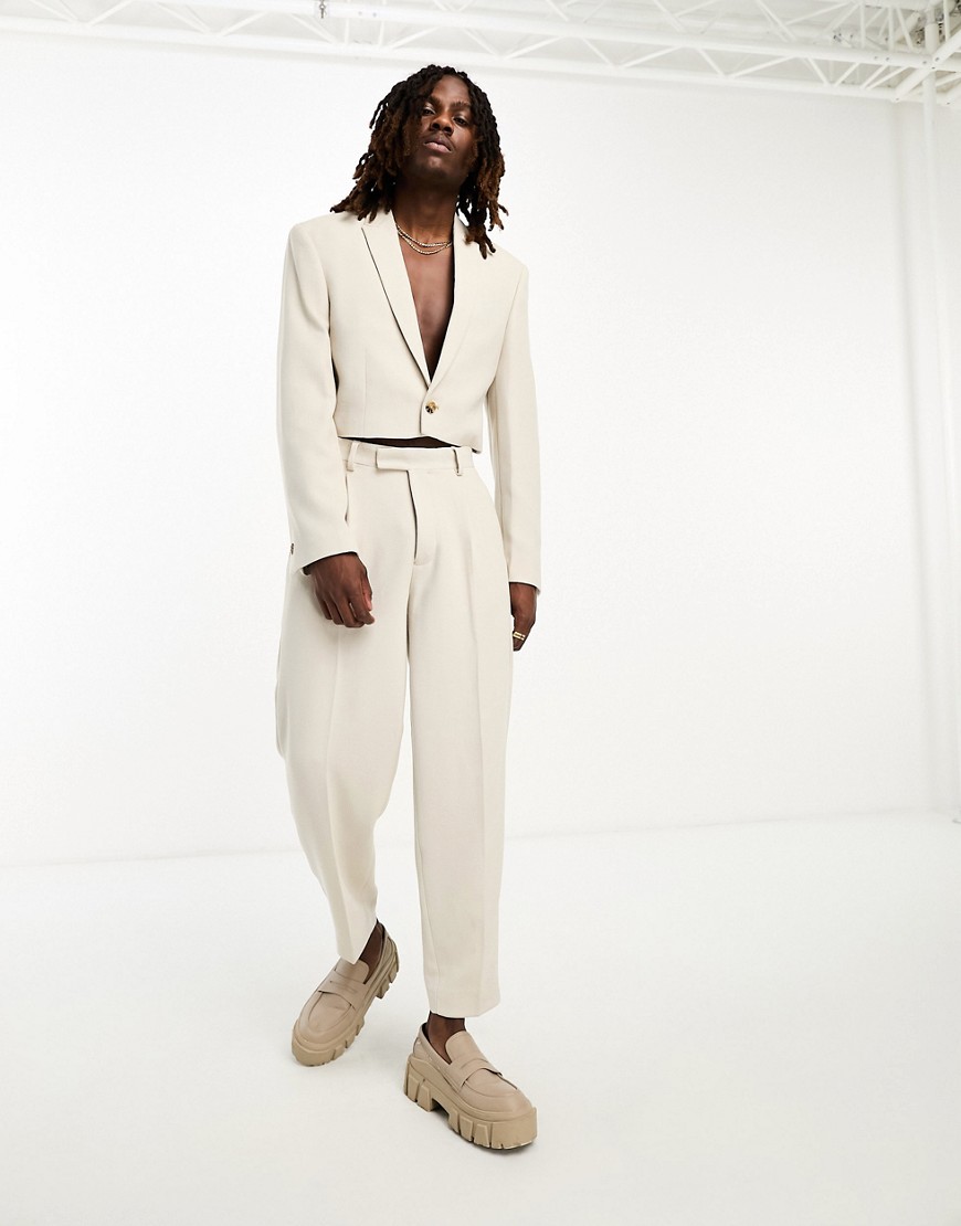 ASOS DESIGN oversized tapered suit trousers in beige textured jersey-Neutral