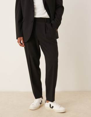 ASOS DESIGN oversized tapered suit trousers in black