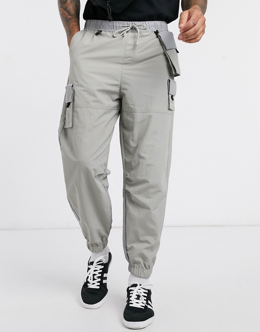 Asos Design Oversized Tapered Sweatpants In Gray With Detachable Pockets-grey