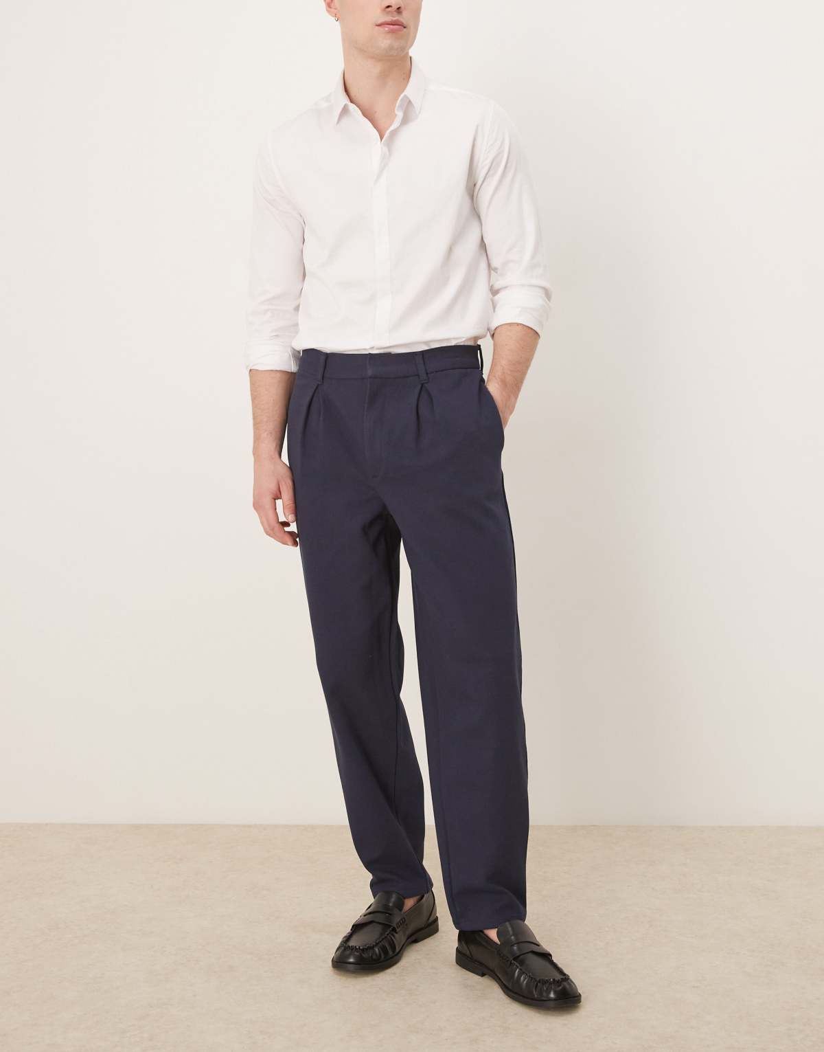 ASOS DESIGN oversized tapered trouser with pleat in navy