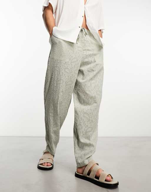 ASOS DESIGN oversized tapered trousers in green