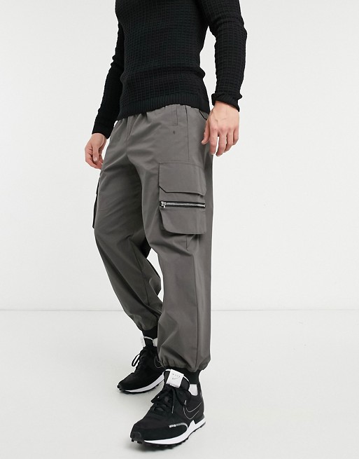 ASOS DESIGN oversized tapered trousers in grey with cargo pockets