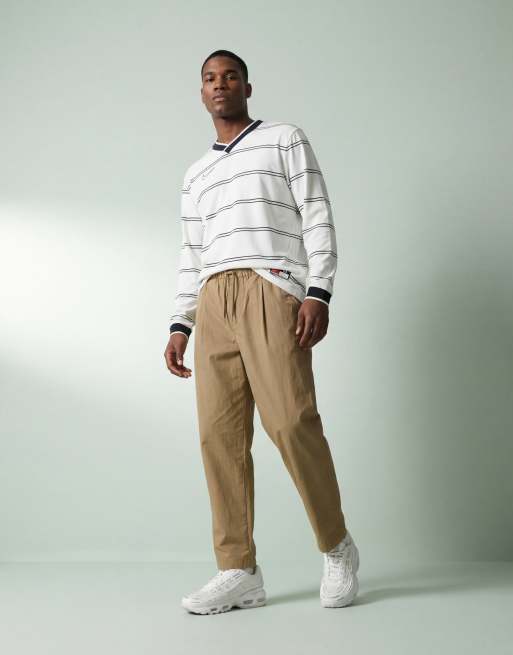 ASOS DESIGN oversized tapered trousers with pleat in tan techy fabric, 9 of 12