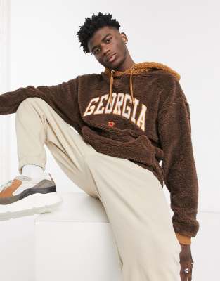 ASOS DESIGN oversized teddy borg hoodie in brown with collegiate chest embroidery