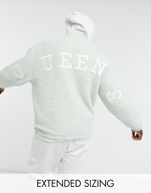 ASOS DESIGN oversized teddy borg track top in pastel green with Queens back applique