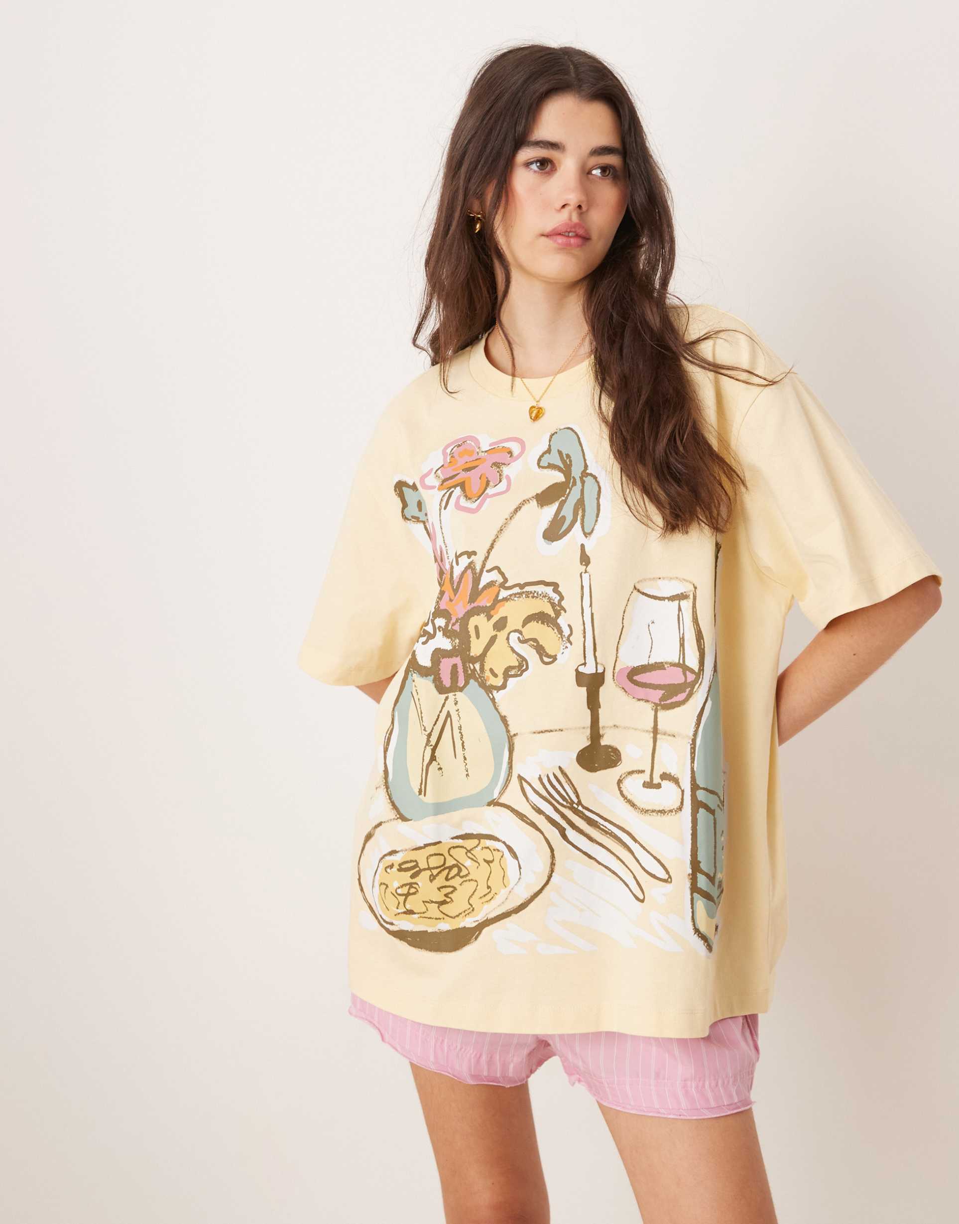 asos design oversized tee with dinner party graphic in buttermilk