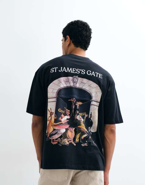 ASOS DESIGN oversized tee with Guinness print in black - view 1