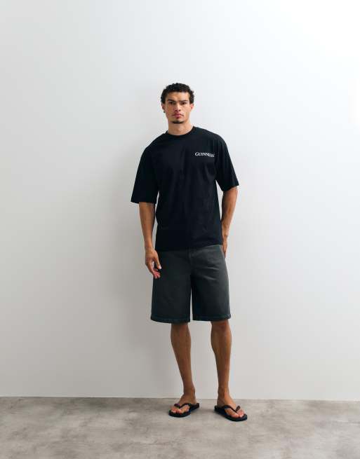 ASOS DESIGN oversized tee with Guinness print in Black, 2 of 5