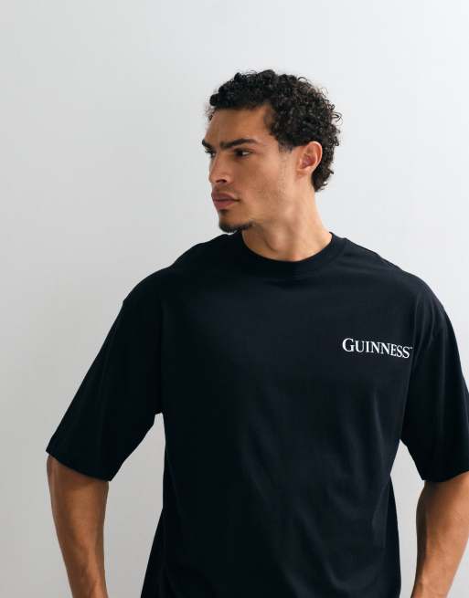 ASOS DESIGN oversized tee with Guinness print in Black, 3 of 5