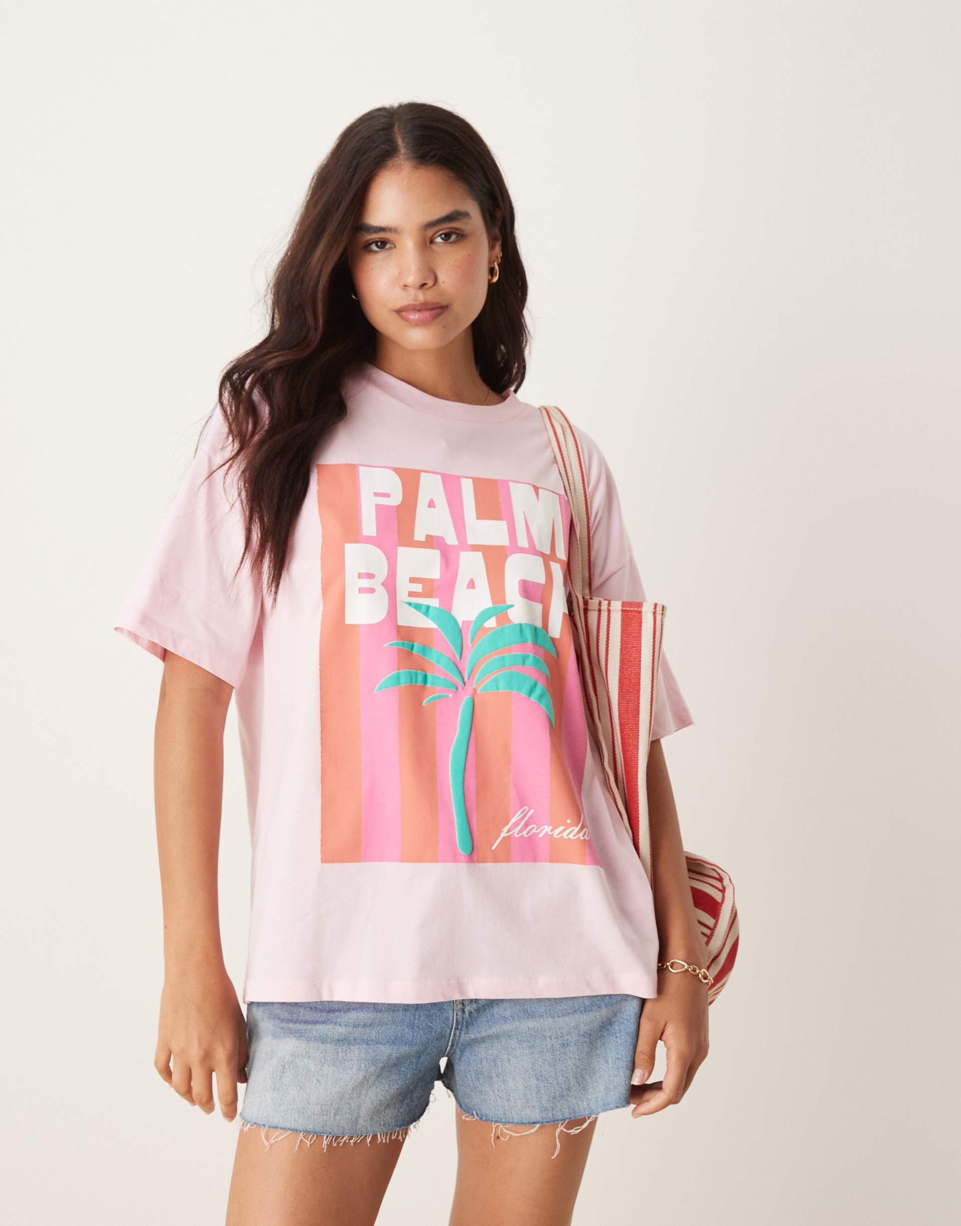 asos design oversized tee with palm tree graphic in pink