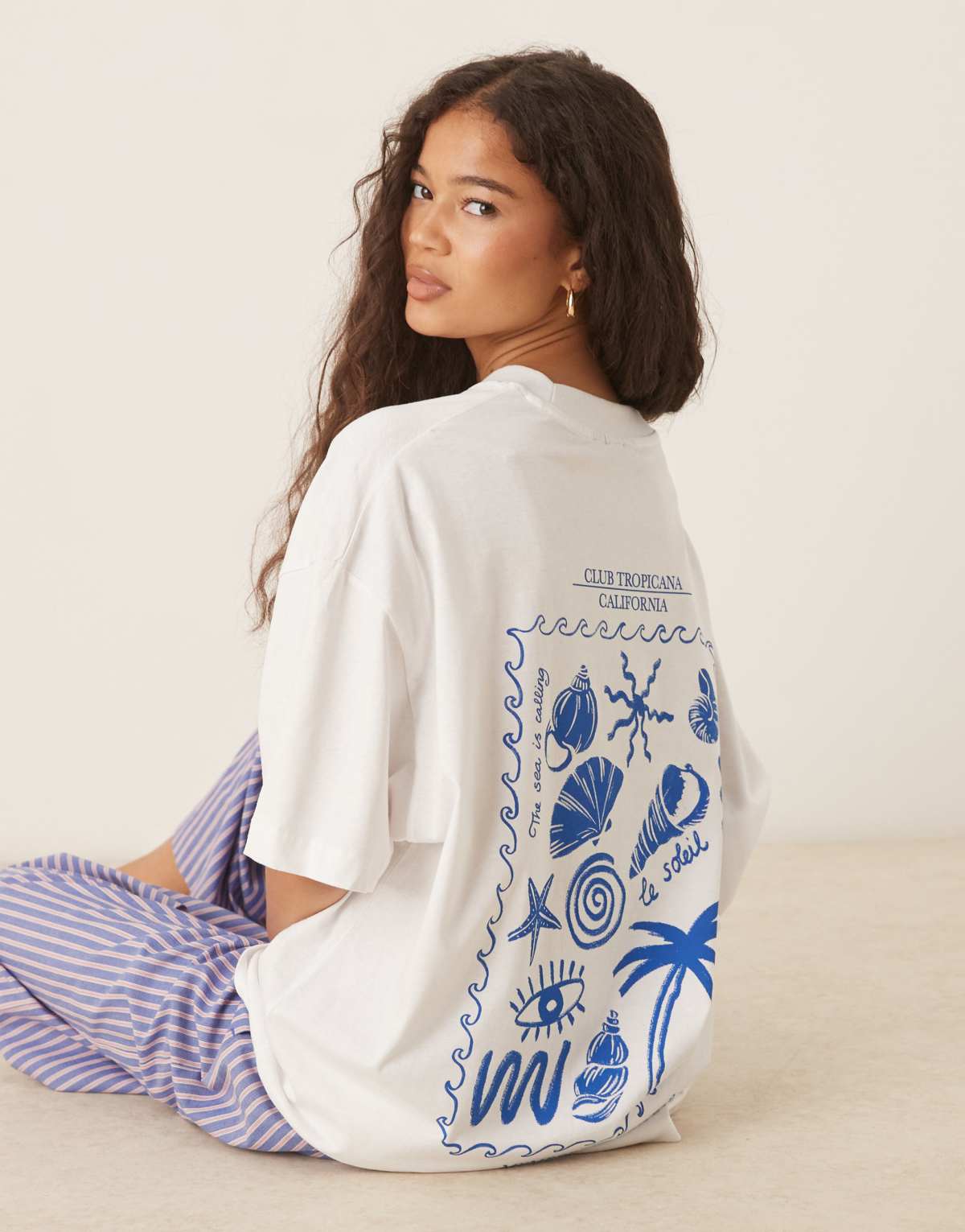 ASOS DESIGN oversized tee with shell back graphic in white