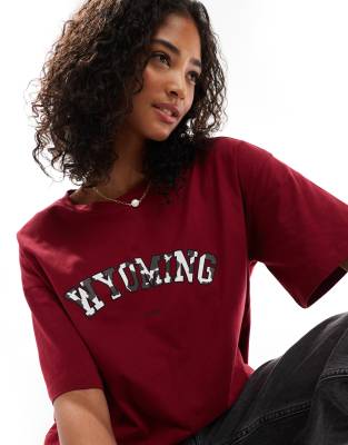 ASOS DESIGN oversized tee with wyoming cow print graphic in wine-Red