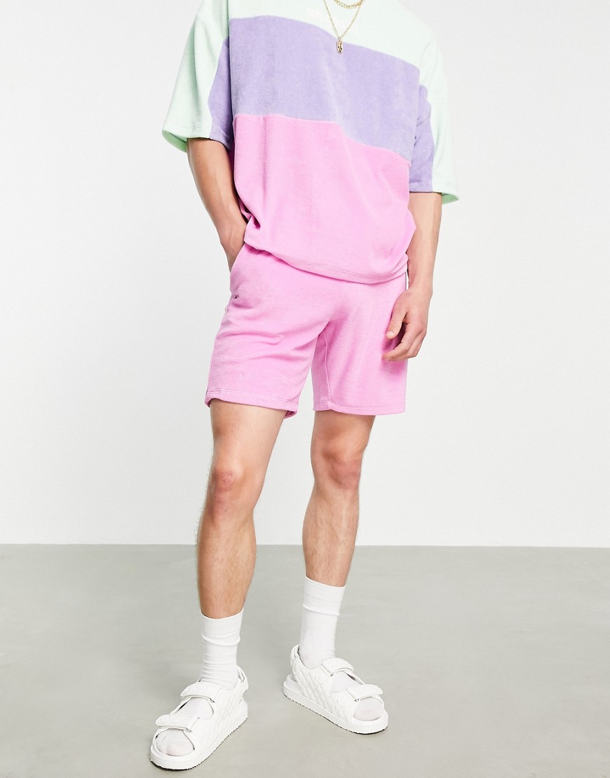 ASOS DESIGN oversized terry shorts in pink - part of a set
