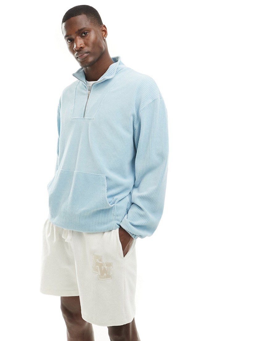 ASOS DESIGN oversized texture sweatshirt with funnel neck in blue