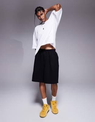 Weekday Simon scuba jersey shorts in black