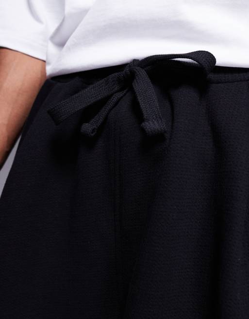 ASOS DESIGN oversized textured basketball short in black