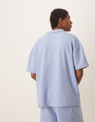 ASOS DESIGN oversized textured polo shirt in light blue - part of a set