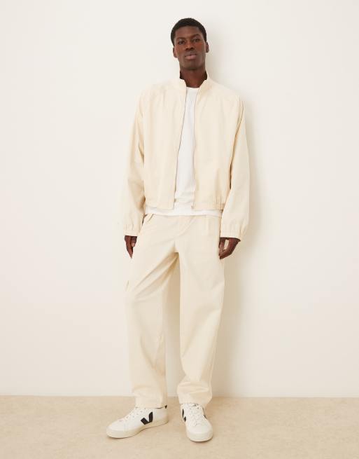 ASOS DESIGN - Oversized toelopende broek met diep plooidetail in ecru, deel van co-ord set, 2 van 5
