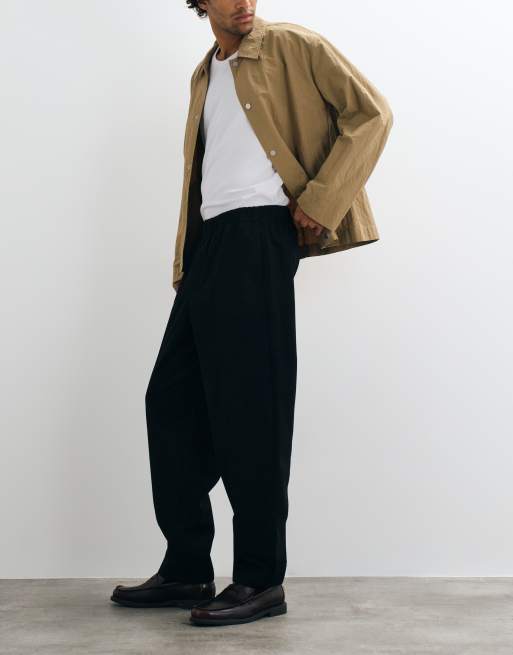 ASOS DESIGN oversized toelopende broek met elastische taille in zwart, 3 van 5