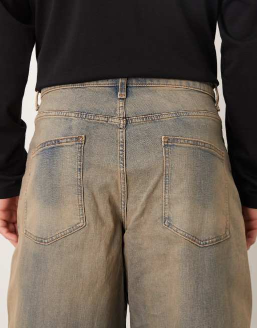 ASOS DESIGN - Oversized toelopende jeans in mid-wash blauw met bruine tint, 5 van 5