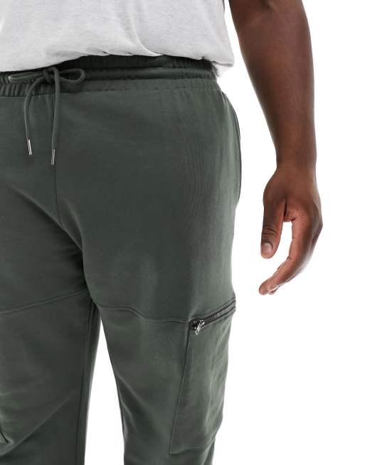 ASOS DESIGN - Oversized toelopende joggingbroek met cargozakken in donkergroen, 3 van 5