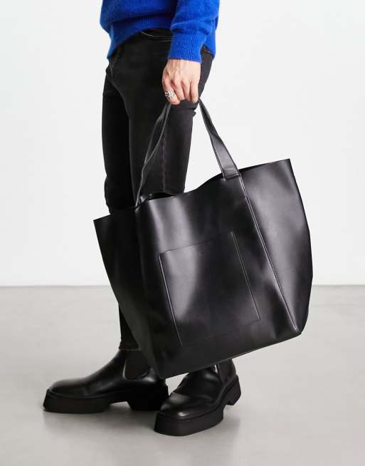 ASOS DESIGN oversized tote bag in black faux leather with detachable wallet