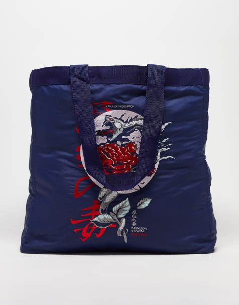 https://images.asos-media.com/products/asos-design-oversized-tote-bag-in-navy-with-dragon-embroidery/202807507-1-midblue/?$n_480w$&wid=476&fit=constrain