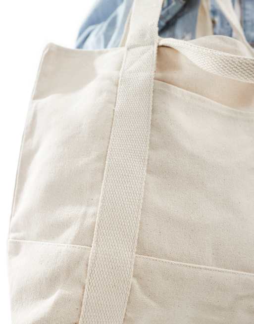 ASOS DESIGN - Oversized tote van zwaar katoen met handvatten en schouderband in ecru , 3 van 4