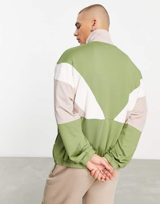 ASOS DESIGN oversized track jacket in green color block ASOS