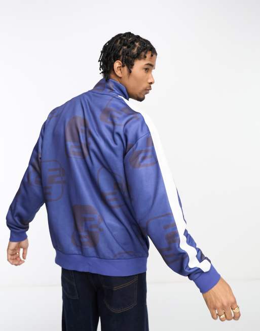 ASOS DESIGN oversized track jacket in navy all over print with taping and  high build print