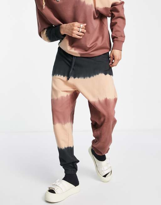 ASOS DESIGN oversized trackies in brown with tie dye details (part of a set)