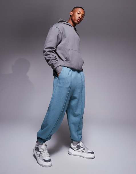 ASOS DESIGN oversized trackies with seam detail in washed blue - view 1