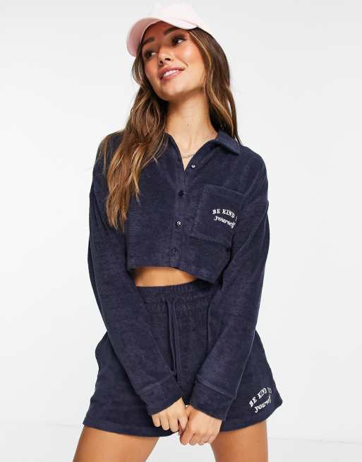 ASOS DESIGN oversized tracksuit in towelling with button-through sweatshirt / sweat shorts in petrol blue