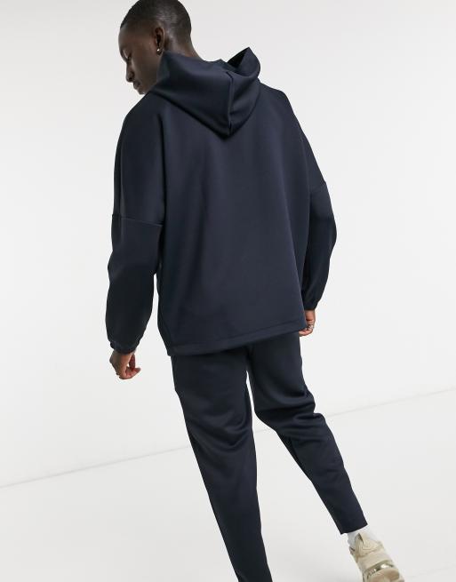 ASOS DESIGN oversized tracksuit with dropped shoulder hoodie in navy scuba