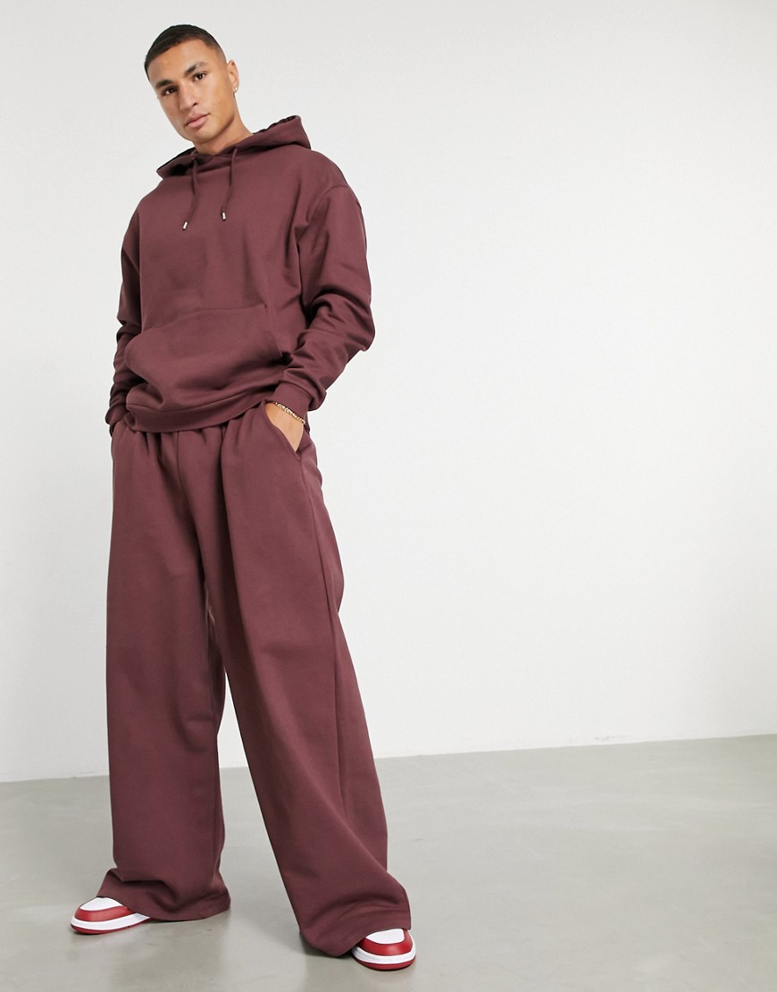 ASOS DESIGN oversized tracksuit with hoodie and oversized wide leg sweatpants in burgundy-Red
