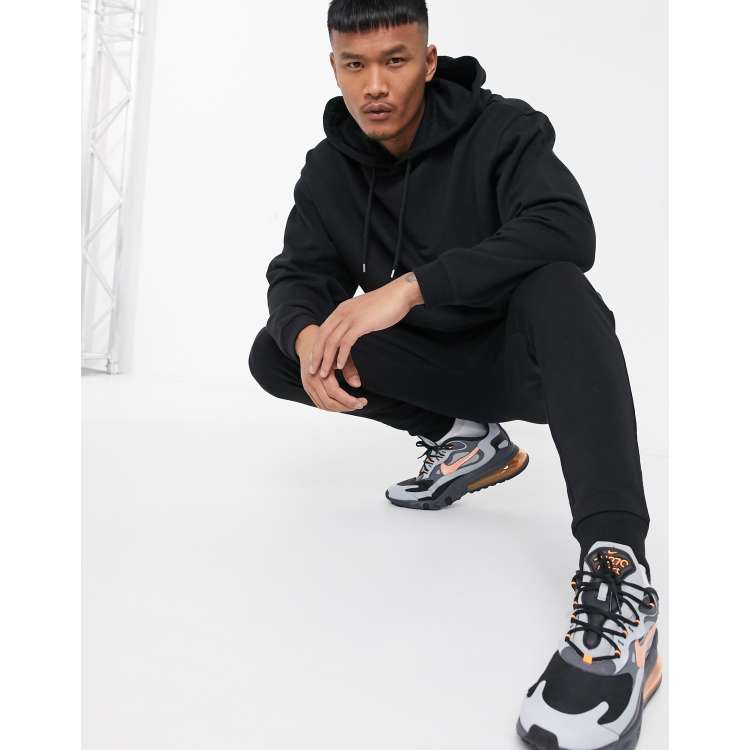 ASOS DESIGN tracksuit ultimate oversized hoodie / sweatpants in black -  ShopStyle Activewear Pants