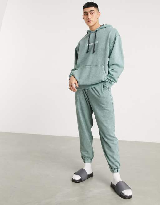 ASOS DESIGN oversized tracksuit with hoodie in vintage washed green