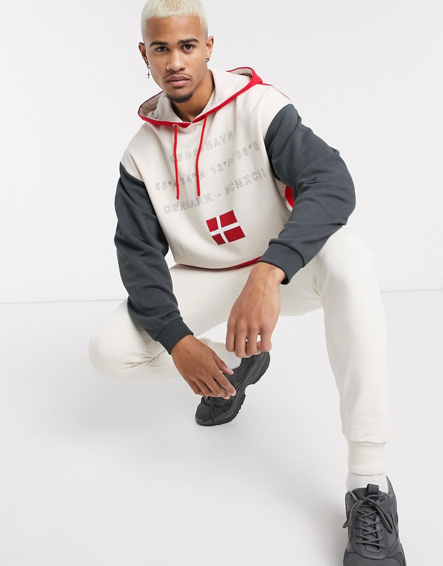 ASOS DESIGN oversized tracksuit with hoodie & skinny joggers in colour block-White