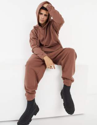 ASOS DESIGN oversized tracksuit with hoodie & super oversized sweatpants in washed brown