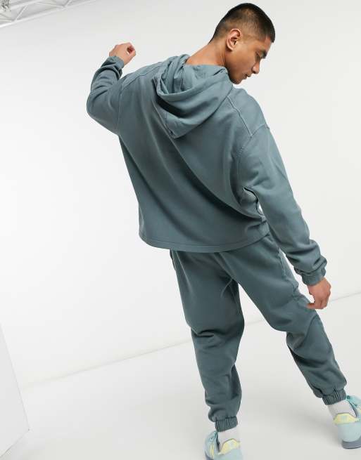 ASOS DESIGN tracksuit with oversized hoodie and oversized joggers in khaki