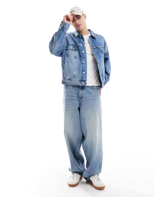 ASOS DESIGN oversized trucker jacket in mid wash blue