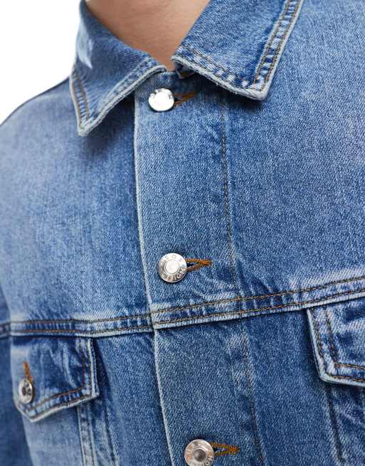 ASOS DESIGN oversized trucker jacket in mid wash blue
