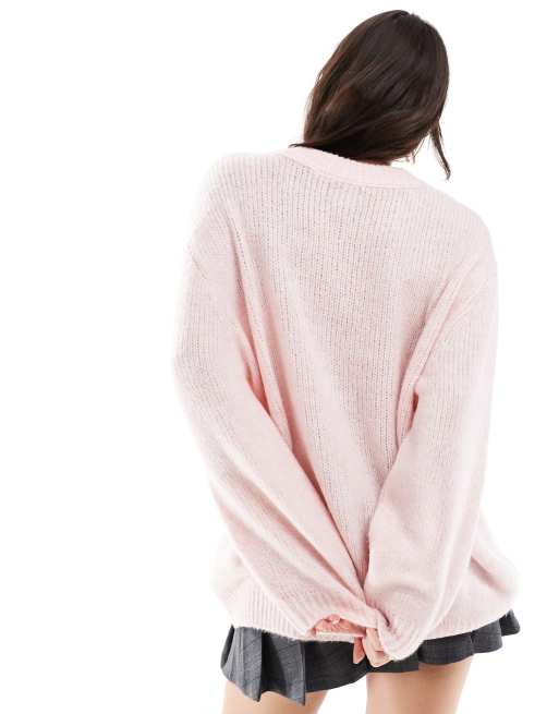 ASOS DESIGN oversized crew neck jumper in pink